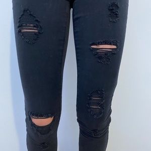 Woman Black Ripped Jean Jeggings